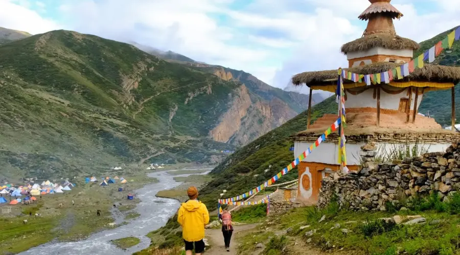 People walking near a stupa at Shey Gompa Dolpo