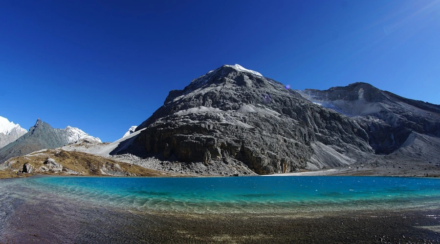 Beautiful lake with blue water and a mountain in Tibet