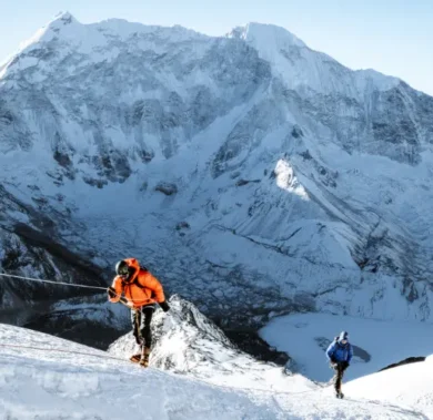 Mountaineers climbing Island Peak using ropes