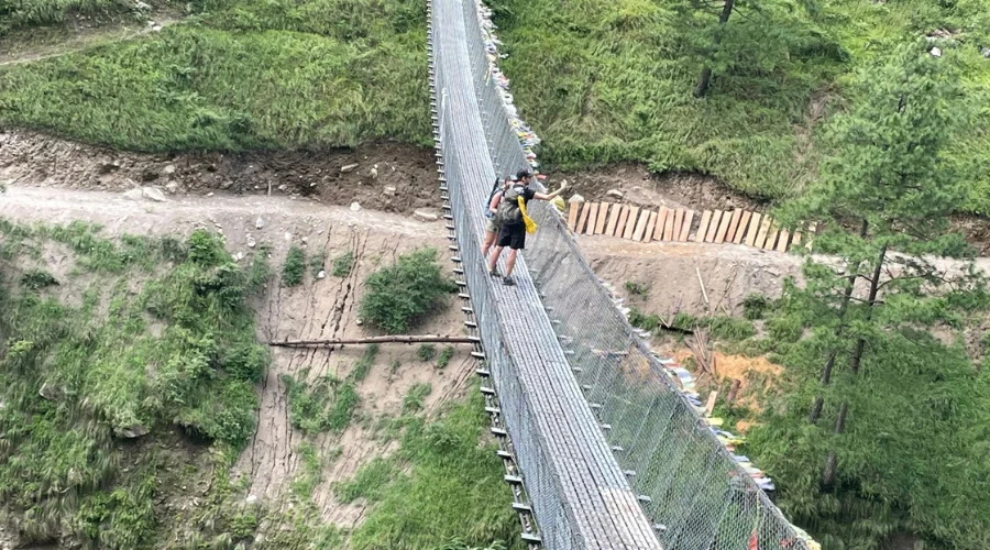 Trekkers at Suspension bridge of Manaslu Region