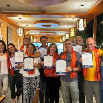 Trekkers receiving certificate from Himalayan Masters Team