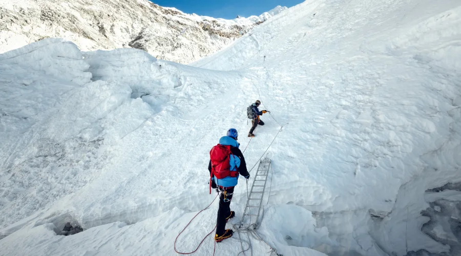 Crossing ladders during the Island Peak Expedition