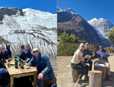 Our Himalayan Masters team with trekkers having warm drinks