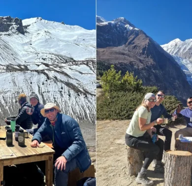 Our Himalayan Masters team with trekkers having warm drinks