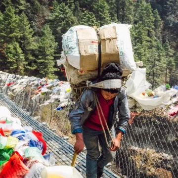 Porters carrying load in trek