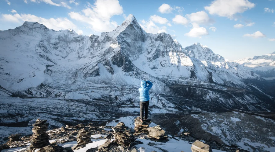 Trekker clicking beautioful views seen from Island Peak