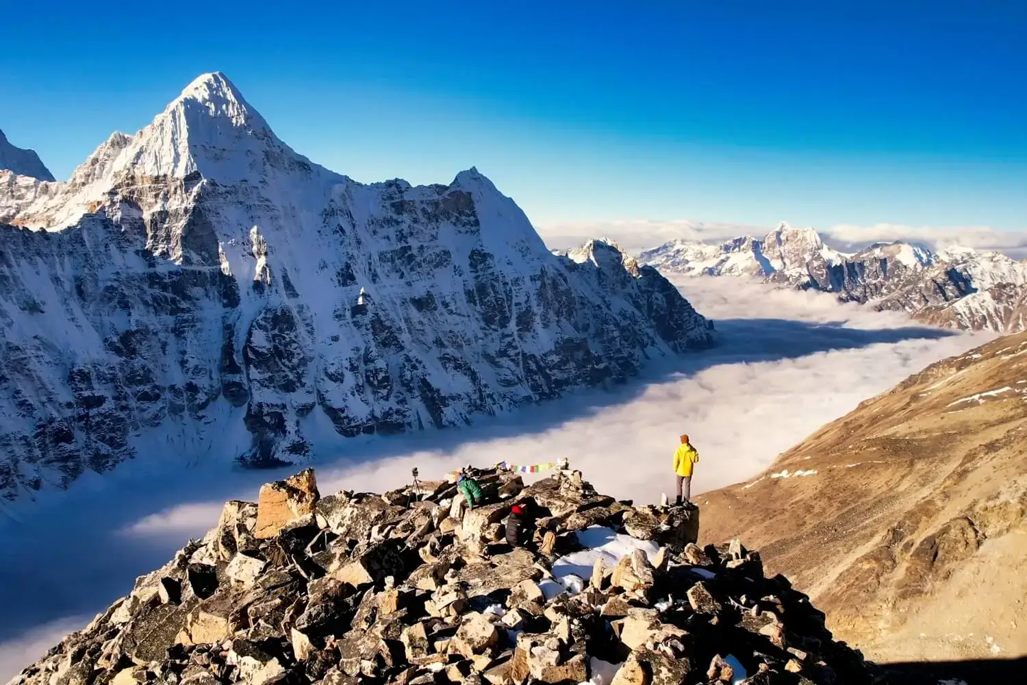 Hiker overlooking Kanchenjunga mountains