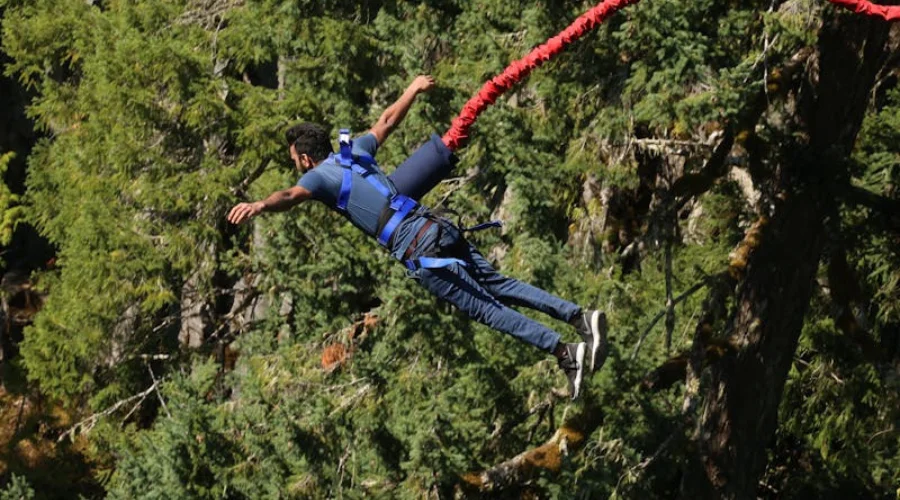 A man living each moment while bungee jumping