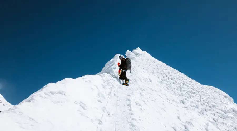 A mountaineer attempting a summit