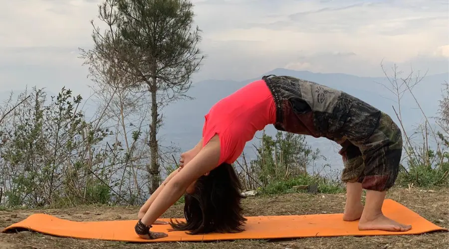 A yoga practitioner practising ashtanga for stretching and better flexibility
